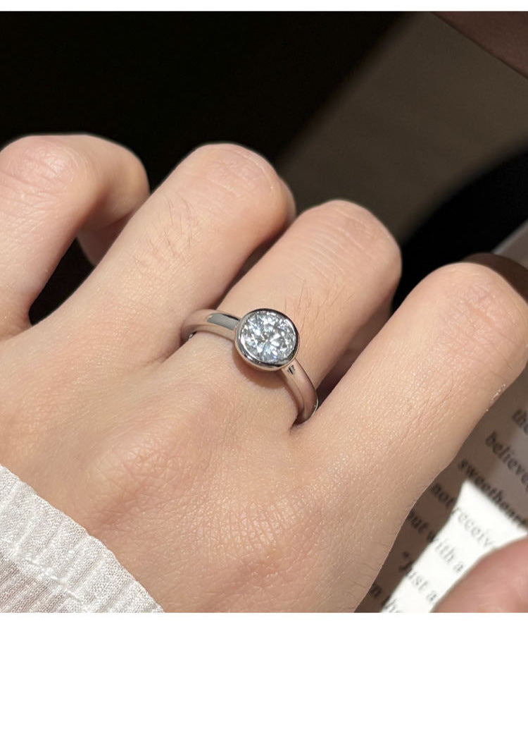 925 Silver Round Halo Pave Band Engagement Ring in palm of hand